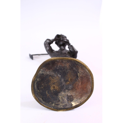 232 - A JAPANESE MEIJI PERIOD BRONZE OKIMONO - SMOKING MAN, the figure stood upon stylized base, holding h... 