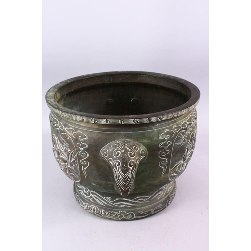 233 - A 19TH CENTURY CHINESE BRONZE IMMORTAL TWIN HANDLED CENSER, with carved panel decoration depicting i... 