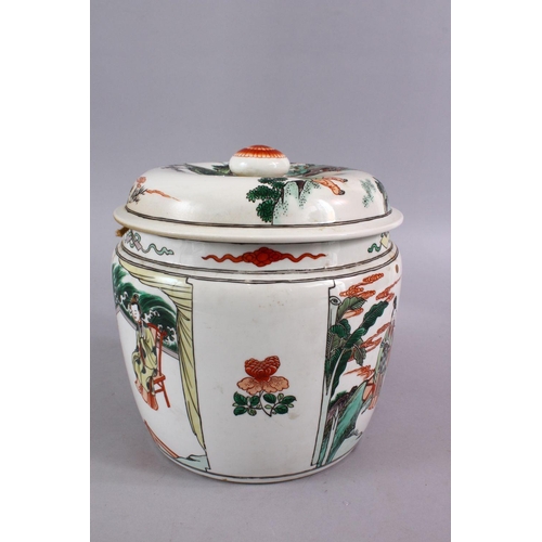 24 - A CHINESE FAMILLE VERTE PORCELAIN JAR AND COVER, decorated with scenes of figures in a balcony setti... 