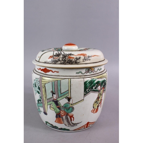 24 - A CHINESE FAMILLE VERTE PORCELAIN JAR AND COVER, decorated with scenes of figures in a balcony setti... 