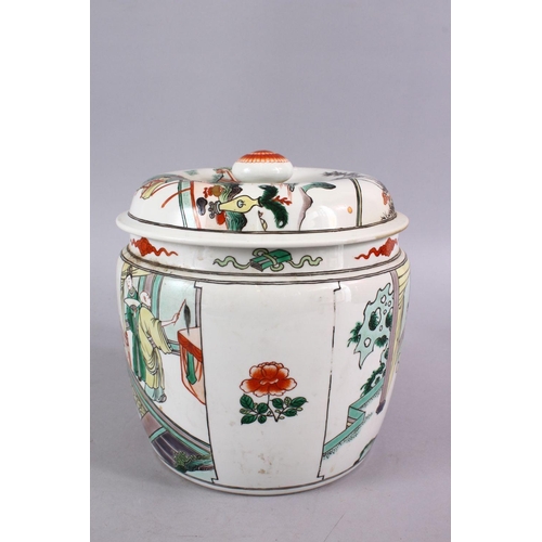 24 - A CHINESE FAMILLE VERTE PORCELAIN JAR AND COVER, decorated with scenes of figures in a balcony setti... 