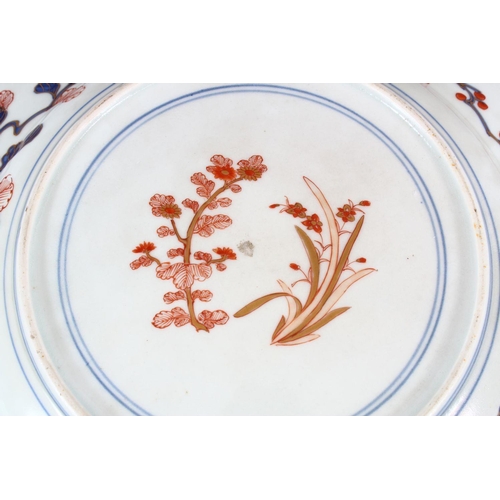 248 - A FINE EARLY 19TH CENTURY JAPANESE IMARI PORCELAIN CHARGER, central decoration of a bird upon a tree... 