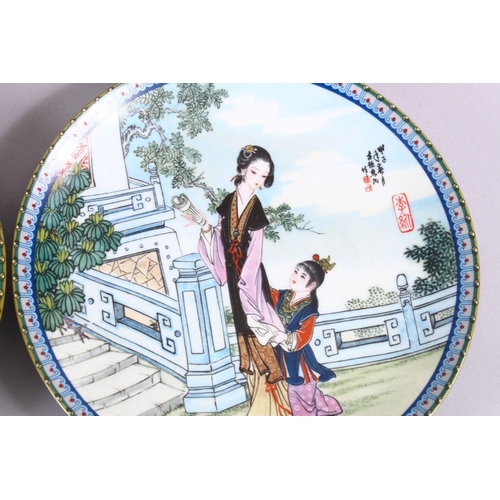 25 - A SET OF SIX CHINESE FAMILLE ROSE PORCELAIN PLATES, each with a different view of a female figure in... 