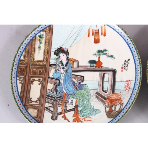 25 - A SET OF SIX CHINESE FAMILLE ROSE PORCELAIN PLATES, each with a different view of a female figure in... 