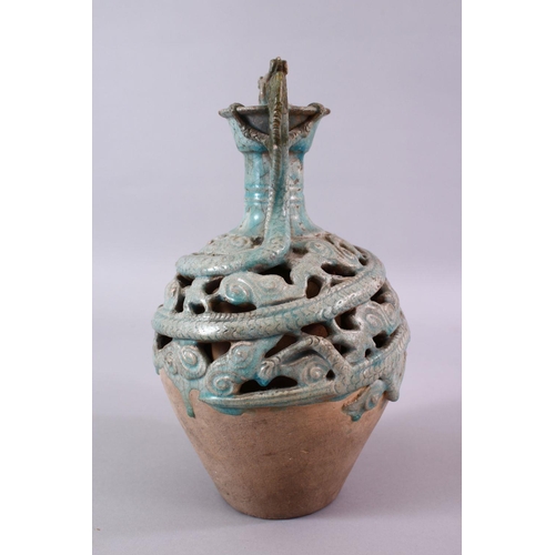 251 - A CHINESE TANG STYLE CELEDON GLAZED DOUBLE WALLED BOTTLE VASE, with dragon handles, 27cm.