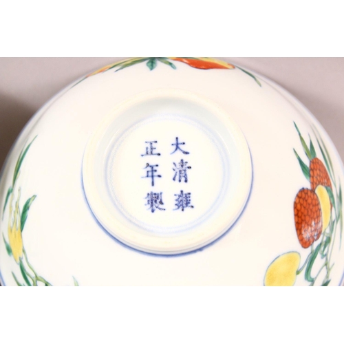 265 - A GOOD QUALITY PAIR OF CHINESE FAMILLE ROSE PORCELAIN PEACH BOWLS, the body of the bowls with decora... 