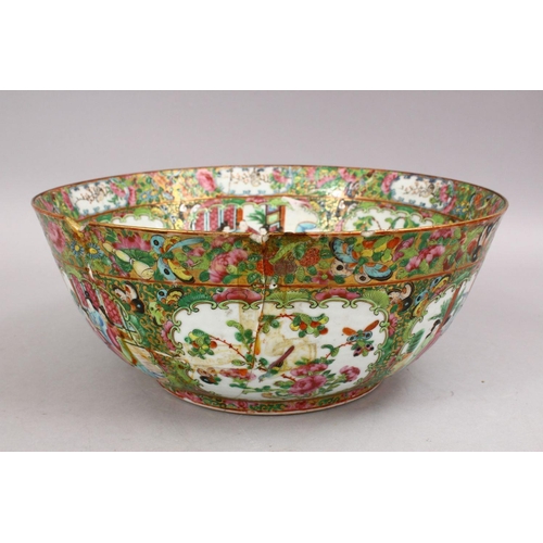 27 - A LARGE 19TH CENTURY CHINESE CANTON FAMILLE ROSE PORCELAIN BOWL, with panel decoration of figures, b... 