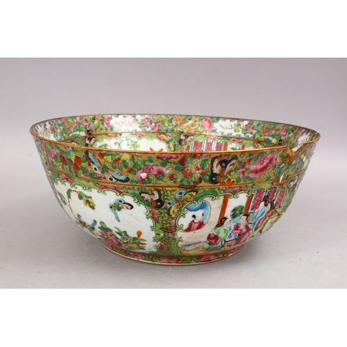 27 - A LARGE 19TH CENTURY CHINESE CANTON FAMILLE ROSE PORCELAIN BOWL, with panel decoration of figures, b... 