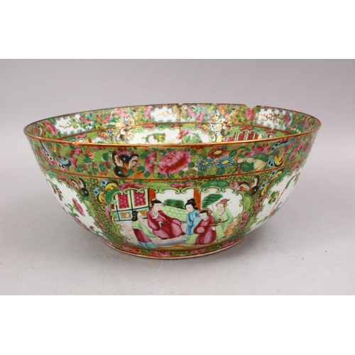 27 - A LARGE 19TH CENTURY CHINESE CANTON FAMILLE ROSE PORCELAIN BOWL, with panel decoration of figures, b... 