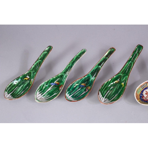 270 - A SET OF FOUR CHINESE PORCELAIN SPOONS, and three other similar.