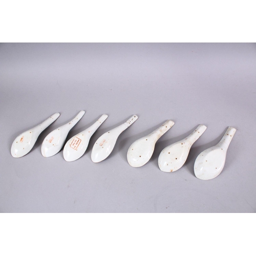 270 - A SET OF FOUR CHINESE PORCELAIN SPOONS, and three other similar.