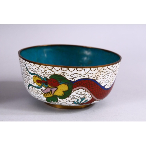 273 - FOUR CHINESE CLOISONNE ITEMS, to include a vase, two bowls and a small dish.