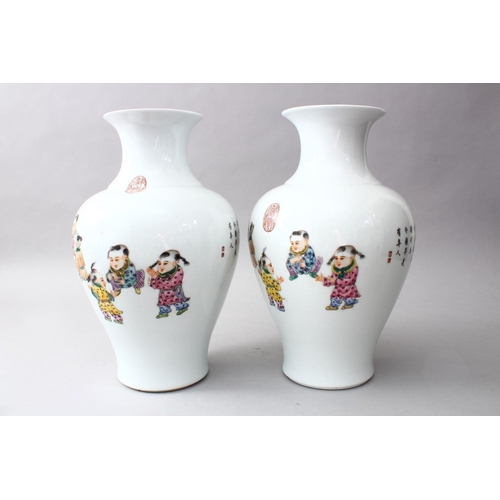 29 - A PAIR OF CHINESE REPUBLIC PERIOD FAMILLE ROSE PORCELAIN VASES OF BOYS PLAYING, the body of the vase... 