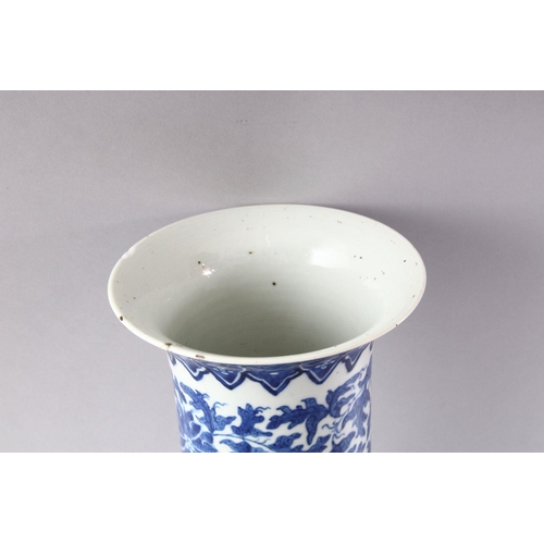 294 - A 19TH CENTURY CHINESE BLUE AND WHITE PORCELAIN SLEEVE VASE, with flared rim, floral decoration and ... 