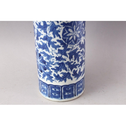 294 - A 19TH CENTURY CHINESE BLUE AND WHITE PORCELAIN SLEEVE VASE, with flared rim, floral decoration and ... 