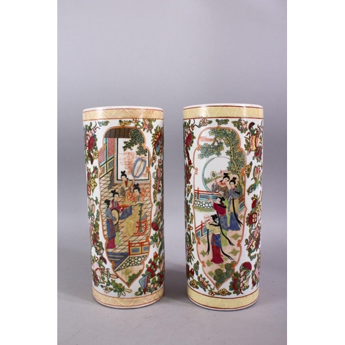 298 - A PAIR OF CHINESE 20TH CENTURY PORCELAIN CYLINDRICAL VASES, painted with panels of female figures an... 