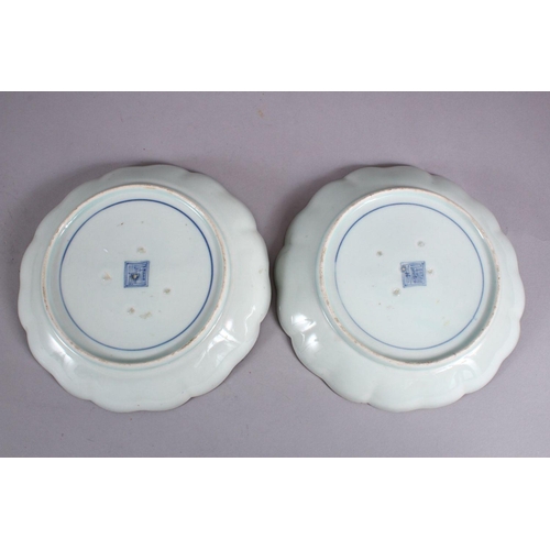 31 - A PAIR OF JAPANESE MEIJI PERIOD BLUE & WHITE ARITA PORCELAIN DISHES, each decorated with native wate... 