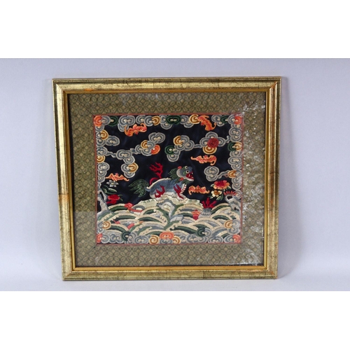 315 - A GROUP OF FIVE CHINESE EMBROIDERED RANK BADGES, framed and glazed, 40cm x 42cm.