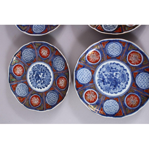 32 - A SET OF SIX JAPANESE MEIJI PERIOD IMARI PORCELAIN PLATES decorated with typical imari palate, with ... 