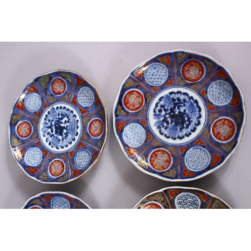 32 - A SET OF SIX JAPANESE MEIJI PERIOD IMARI PORCELAIN PLATES decorated with typical imari palate, with ... 