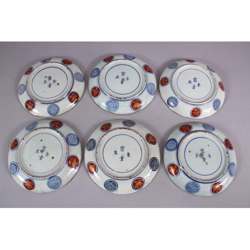 32 - A SET OF SIX JAPANESE MEIJI PERIOD IMARI PORCELAIN PLATES decorated with typical imari palate, with ... 