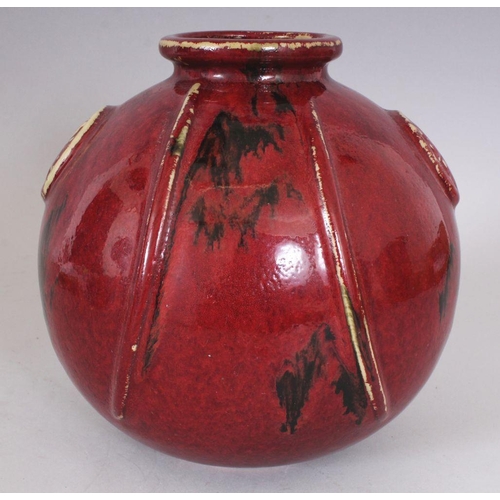 320 - AN UNUSUAL JAPANESE FLAMBE GLAZED & MOULDED STUDIO POTTERY PORCELAIN VASE, 19.8cm wide, 20.3cm high.