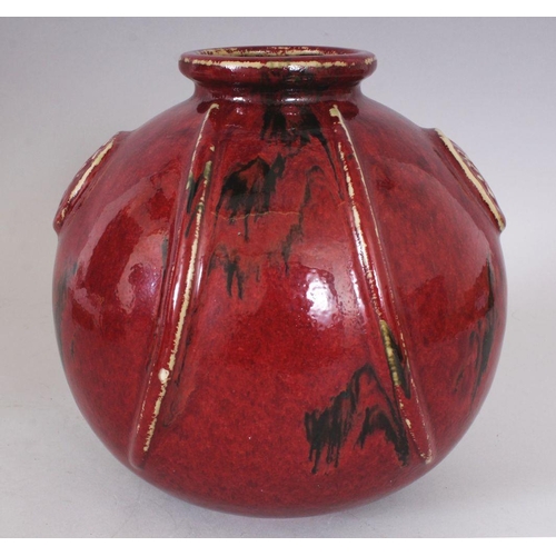 320 - AN UNUSUAL JAPANESE FLAMBE GLAZED & MOULDED STUDIO POTTERY PORCELAIN VASE, 19.8cm wide, 20.3cm high.