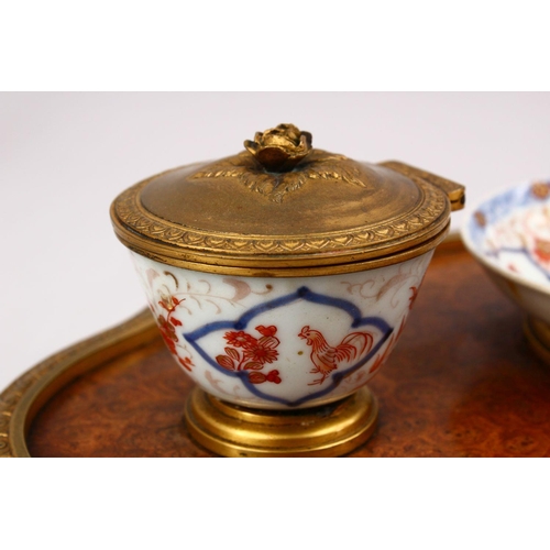 330 - AN 18TH / 19TH CENTURY CHINESE IMARI PORCELAIN DISH AND CUPS - MOUNTED, the two cups and saucer dish... 