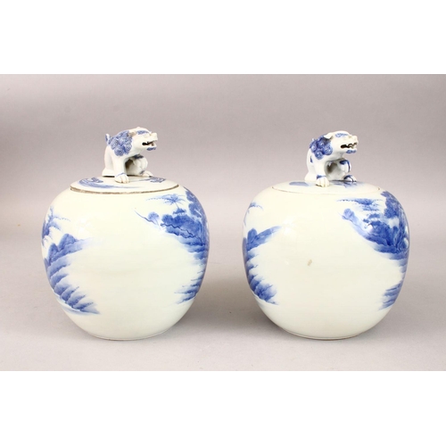 332 - TWO JAPANESE HIRADO STYLE BLUE & WHITE JARS & COVERS, the body of the vases with decoration depictin... 