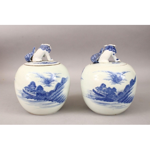 332 - TWO JAPANESE HIRADO STYLE BLUE & WHITE JARS & COVERS, the body of the vases with decoration depictin... 