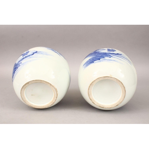 332 - TWO JAPANESE HIRADO STYLE BLUE & WHITE JARS & COVERS, the body of the vases with decoration depictin... 