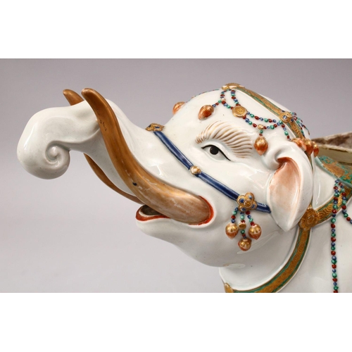 338 - A GOOD JAPANESE MEIJI PERIOD KUTANI PORCELAIN ELEPHANT FIGURE, the figure in a striding pose with ku... 