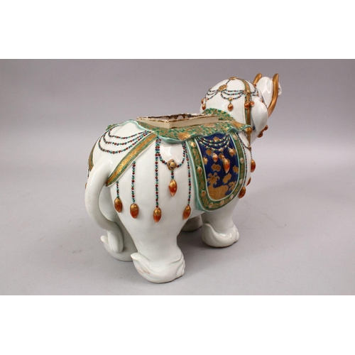 338 - A GOOD JAPANESE MEIJI PERIOD KUTANI PORCELAIN ELEPHANT FIGURE, the figure in a striding pose with ku... 