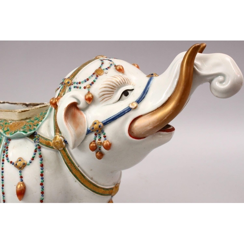 338 - A GOOD JAPANESE MEIJI PERIOD KUTANI PORCELAIN ELEPHANT FIGURE, the figure in a striding pose with ku... 