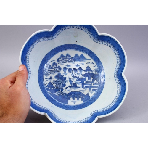 343 - AN 18TH CENTURY CHINESE BLUE AND WHITE PORCELAIN LOBED EDGE BOWL, the bowl decorated with landscapes... 