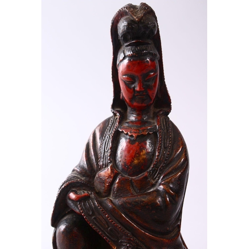 349 - A 19TH CENTURY CHINESE CARVED WOOD & LACQUER FIGURE OF GUANYIN, in a seated position, with carved wa... 