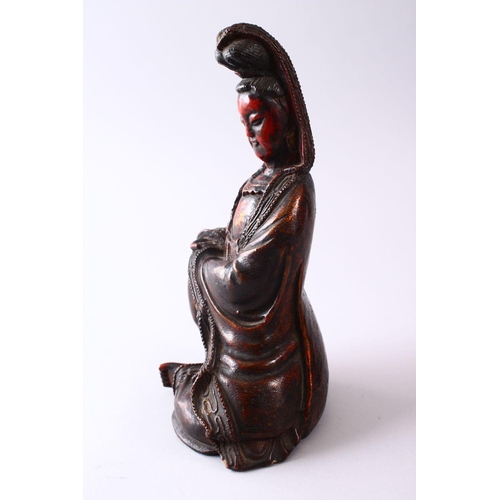 349 - A 19TH CENTURY CHINESE CARVED WOOD & LACQUER FIGURE OF GUANYIN, in a seated position, with carved wa... 