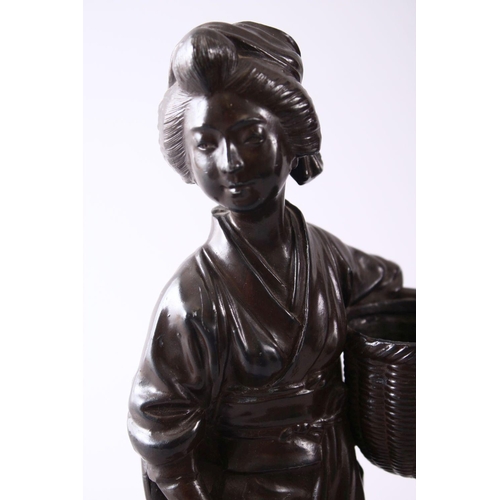 354 - A JAPANESE MEIJI STYLE METAL OKIMONO OF A GEISHA GIRL HOLDING A BASKET, 28CM.