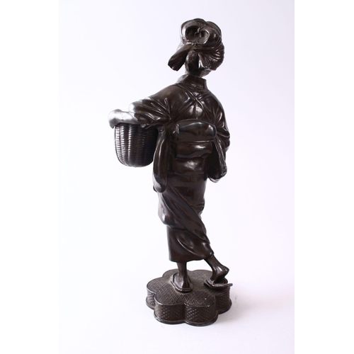 354 - A JAPANESE MEIJI STYLE METAL OKIMONO OF A GEISHA GIRL HOLDING A BASKET, 28CM.