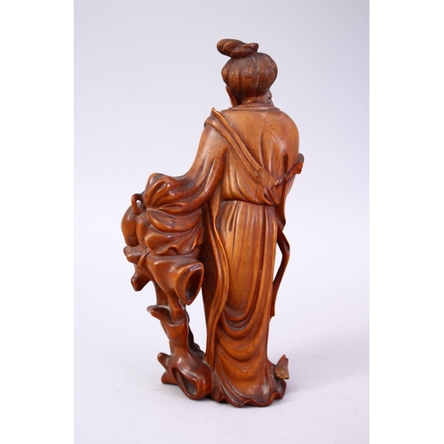 357 - A CHINESE CARVED WOODEN FIGURE OF GUANYIN & ANIMAL, stood aside a tree stump with an a animal, 20cm ... 