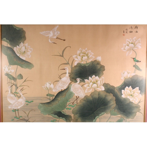 386 - A LARGE CHINESE PICTURE OF CRANES around a lily pond, 76cm x 107cm.