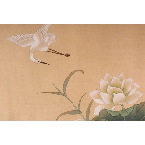 386 - A LARGE CHINESE PICTURE OF CRANES around a lily pond, 76cm x 107cm.