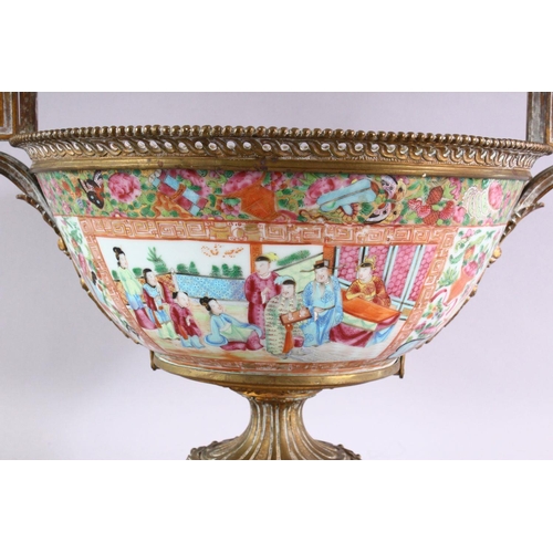 389 - A GOOD 19TH CENTURY CANTON PORCELAIN BOWL, with French ormolu mounts, the bowl painted with panels o... 