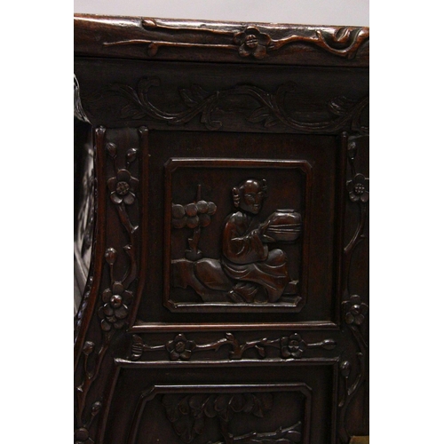 397 - A GOOD 19TH CENTURY CHINESE CARVED HARDWOOD / HONGMU CABINET ON STAND, the cabinet with an opening d... 