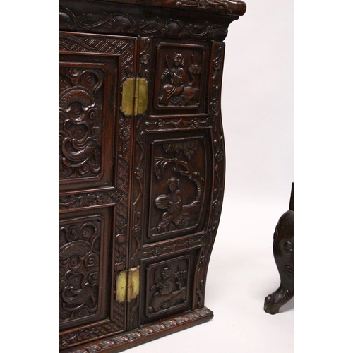 397 - A GOOD 19TH CENTURY CHINESE CARVED HARDWOOD / HONGMU CABINET ON STAND, the cabinet with an opening d... 