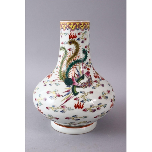 40 - A CHINESE FAMILLE ROSE PORCELAIN BOTTLE SHAPED VASE, decorated with an iron red dragon & phoenix amo... 