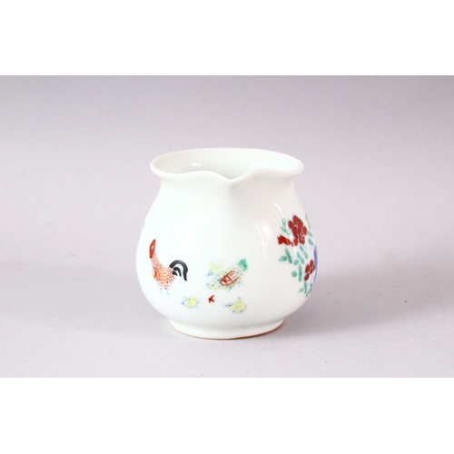 403 - A DOUCAI STYLE PORCELAIN CHICKEN CUP, 7cm high.