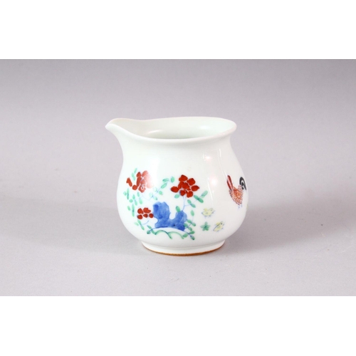 403 - A DOUCAI STYLE PORCELAIN CHICKEN CUP, 7cm high.