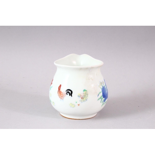 403 - A DOUCAI STYLE PORCELAIN CHICKEN CUP, 7cm high.