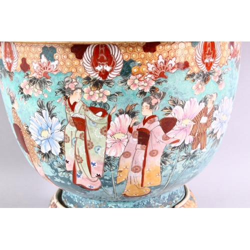 408 - A LARGE 20TH CENTURY SATSUMA JARDINIERE AND STAND, painted with figures in a landscape (AF), overall... 